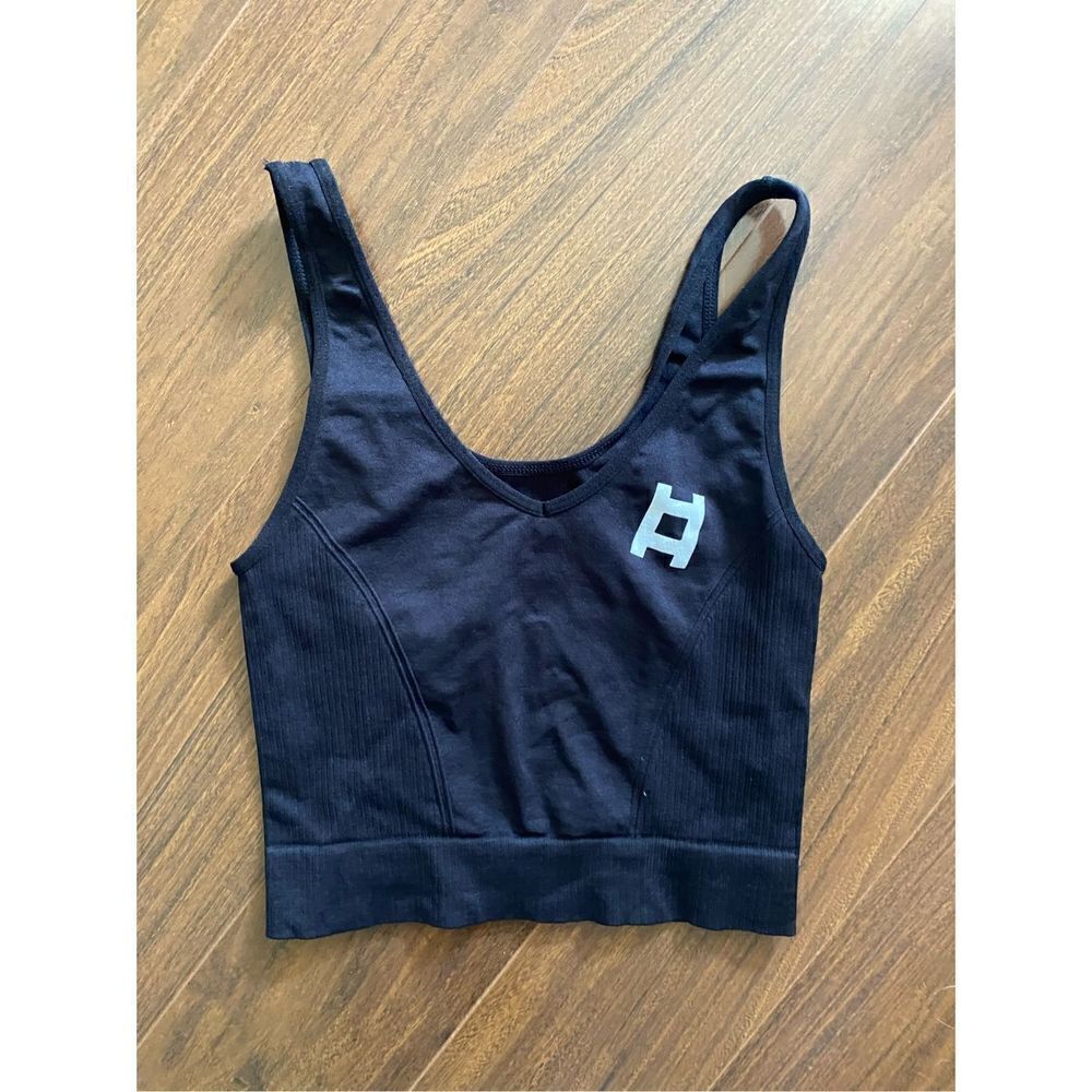ALALA S stretchy black crop workout tank with LADDER logo